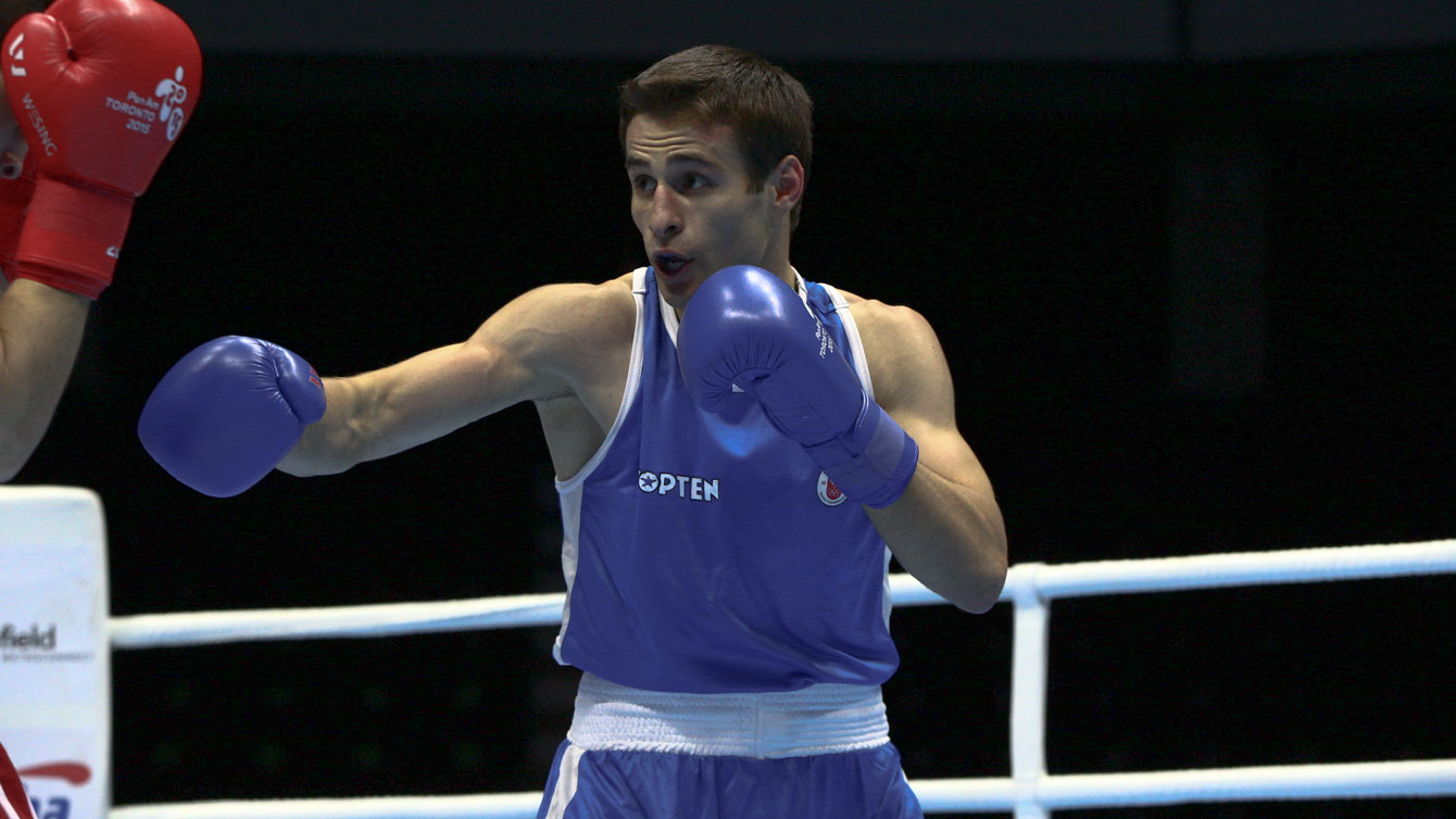 Arthur Biyarslanov fights in the Light Welterweight 64kg preliminary round at TO2015