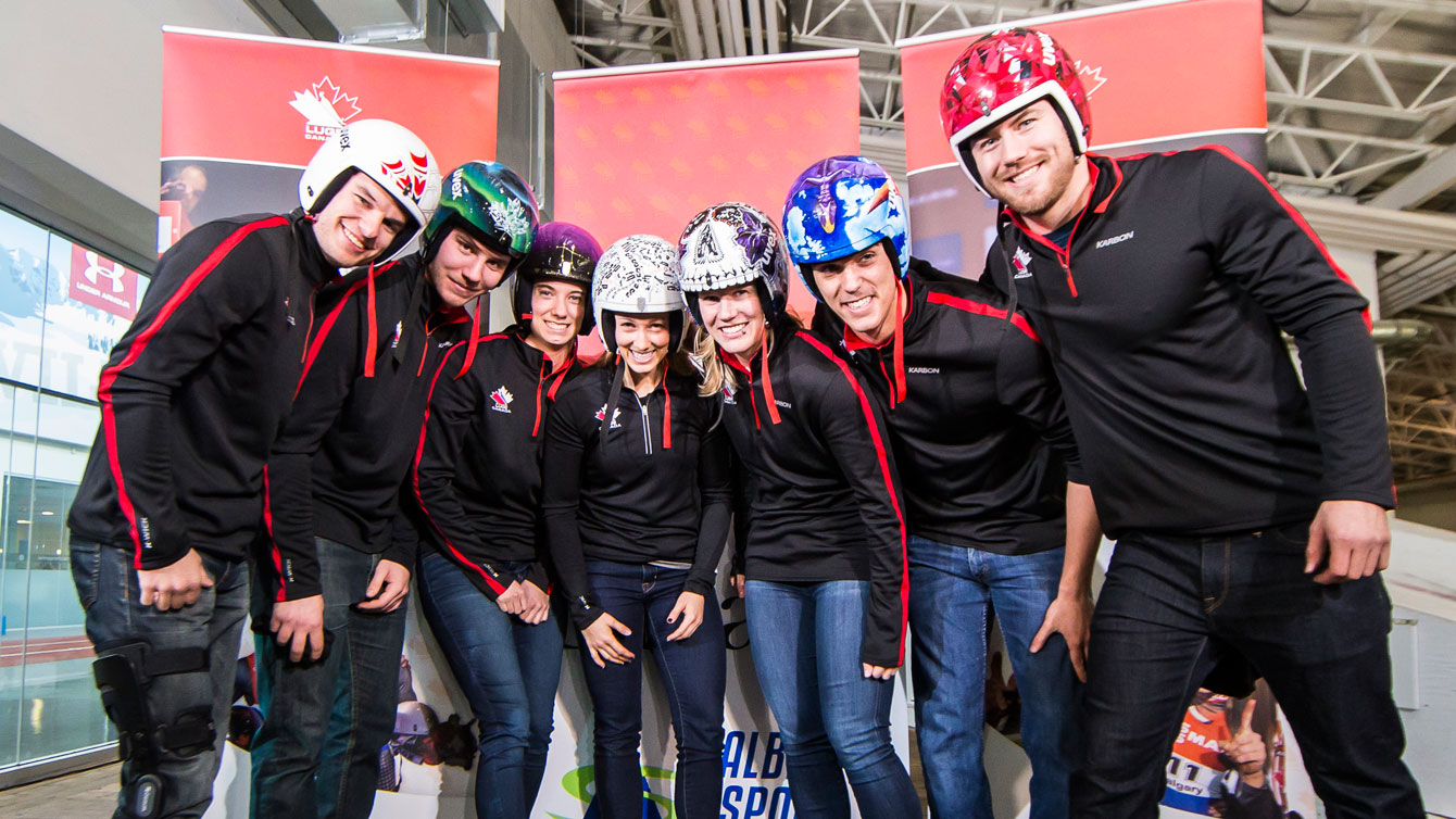 Canadian Luge Association athletes show off their artist-designed helmets on December 14, 2015, ahead of the Luge World Cup in Calgary (Photo: Dave Holland/Luge Canada). 