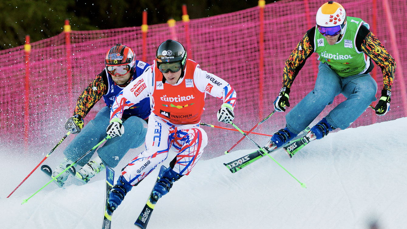 Canada's Brady Leman (left) and Chris Del Bosco (right) chase France's Jean Frederic Chapuis of France during the quarterfinals of the World Cup in Innichen, Italy on December 19, 2015 (Photo: GEPA Pictures for FIS).