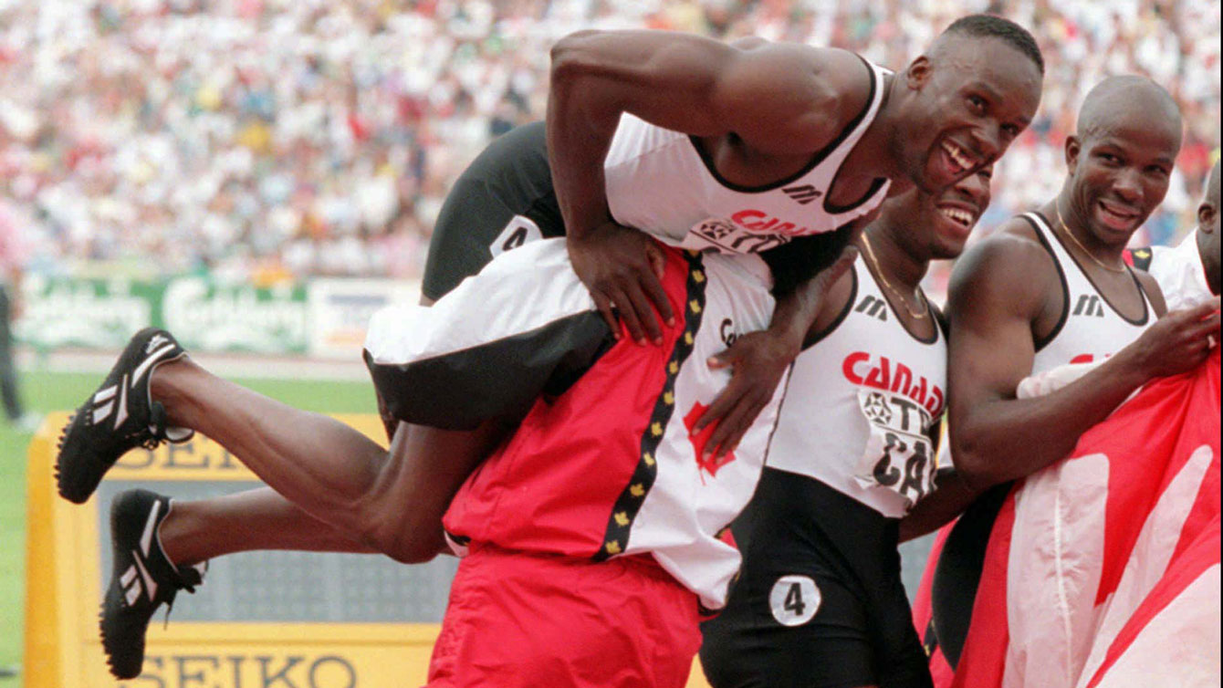 Bruny Surin (left) and Donovan Bailey (right) went 1-2 in Gothenburg 1995, and later (pictured here) celebrated winning relay gold with Glenroy Gilbert and Robert Esmie at the IAAF World Championships in Sweden. 