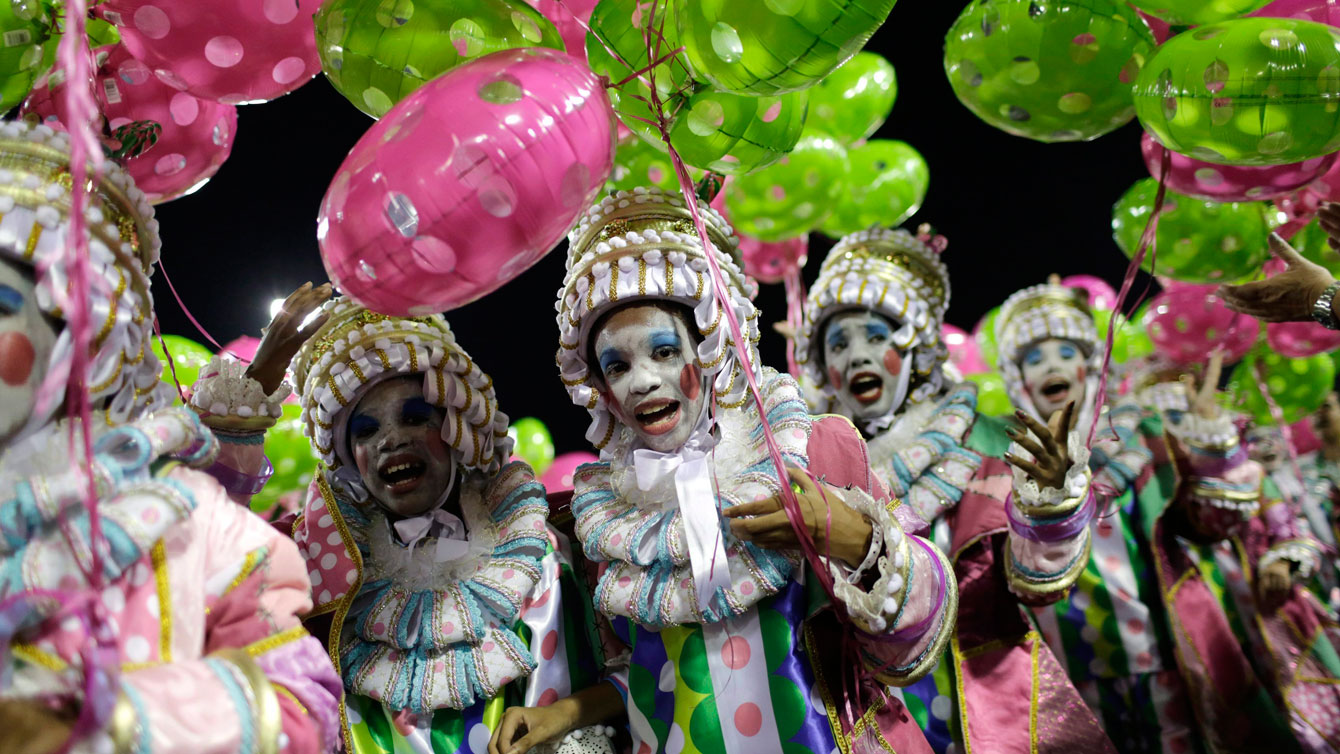 Performers from the Mangueira samba school parade during carnival celebrations at the Sambadrome in Rio de Janeiro, Brazil, 2016. (AP Photo/Leo Correa)
