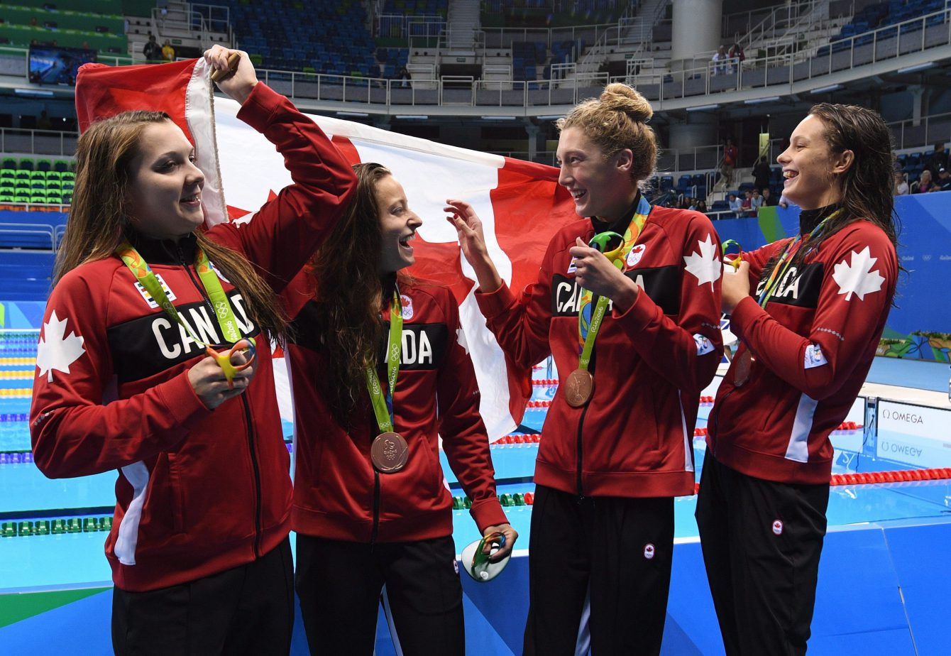 Canada's Brittany MacLean, Katerine Savard, Taylor Ruck, and Penny Oleksiak take bronze in the women's 4 x 200-metre freestyle relay during the 2016 Olympic Summer Games in Rio de Janeiro, Brazil in Wednesday, Aug. 10, 2016. THE CANADIAN PRESS/Sean Kilpatrick